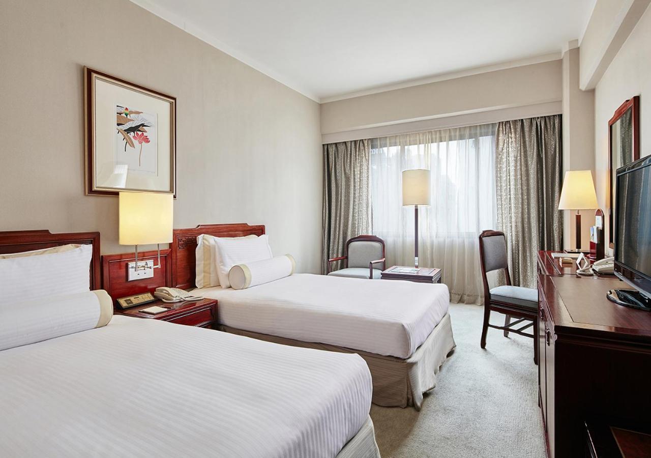 The Howard Plaza Hotel Tajpej Szoba fotó A room at the hotel